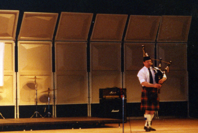 Tim Carey performing his bagpipe